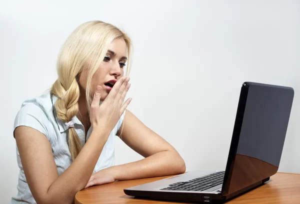 stock image Beautiful girl falls asleep at the computer