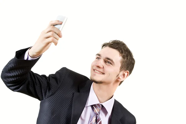Jongen kijkt op de telefoon — Stockfoto