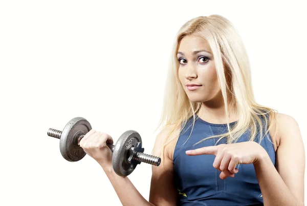 Girl points a finger at a weight — Stock Photo, Image