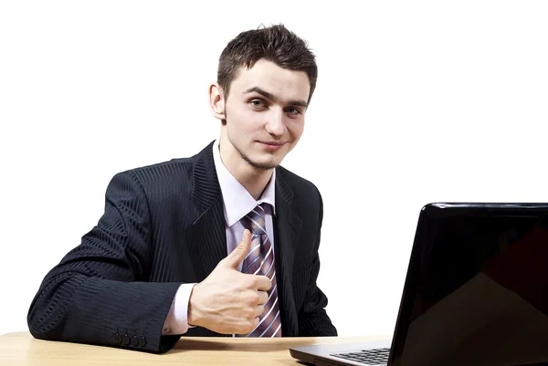 Handsome guy with a laptop — Stock Photo, Image