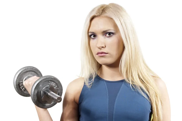 Girl holds a dumbbell isolated — Stock Photo, Image