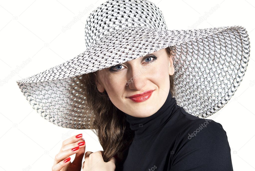 Girl in a hat isolated on white background