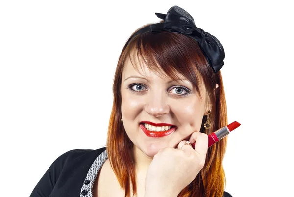 Girl holding a lipstick — Stock Photo, Image