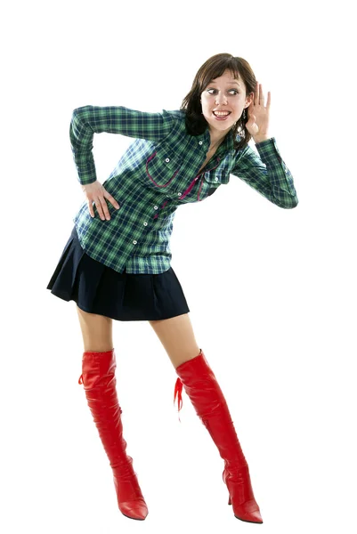 Girl in red boots listening — Stock Photo, Image