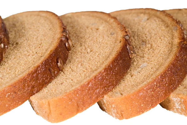 Кусочки хлеба с изолированными семенами — стоковое фото