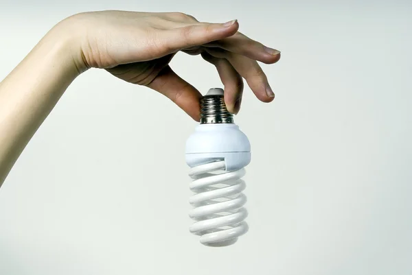 Bella mano tenuta, lampada — Foto Stock