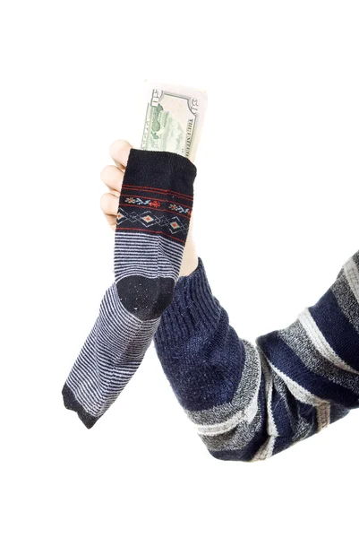 stock image The money is kept in a sock