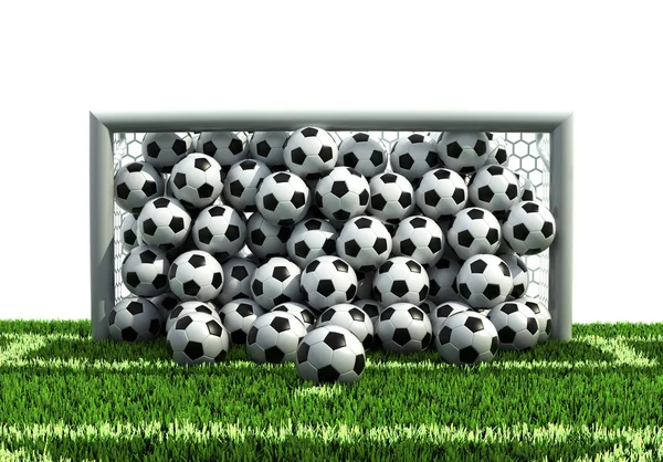 Гол, полный футбольных мячей на футбольном поле — стоковое фото