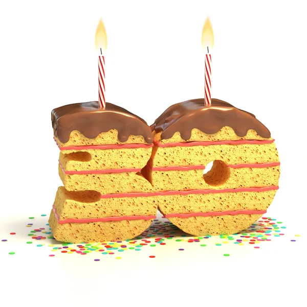 Pastel de cumpleaños de chocolate rodeado de confeti con vela encendida para una celebración del trigésimo cumpleaños o aniversario —  Fotos de Stock