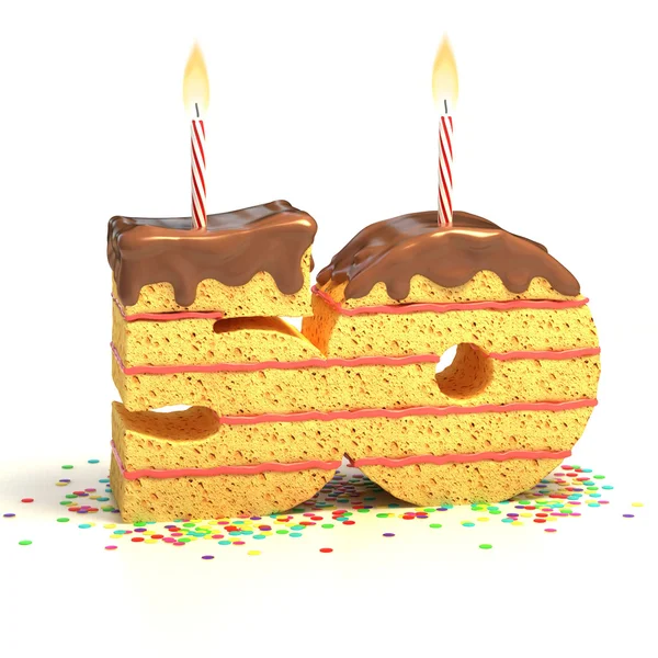 Choklad tårta omgiven av konfetti med tänt ljus för ett femtionde födelsedag eller årsdag firande — Stockfoto