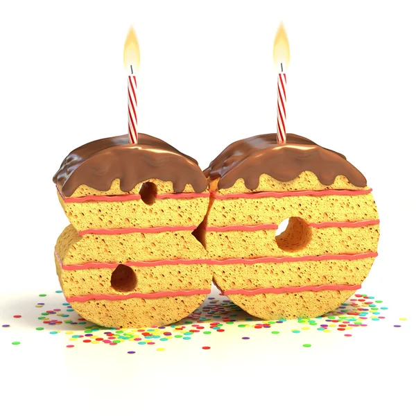 Schokoladen-Geburtstagstorte umgeben von Konfetti mit brennender Kerze für eine Feier zum achtzigsten Geburtstag oder Jubiläum — Stockfoto