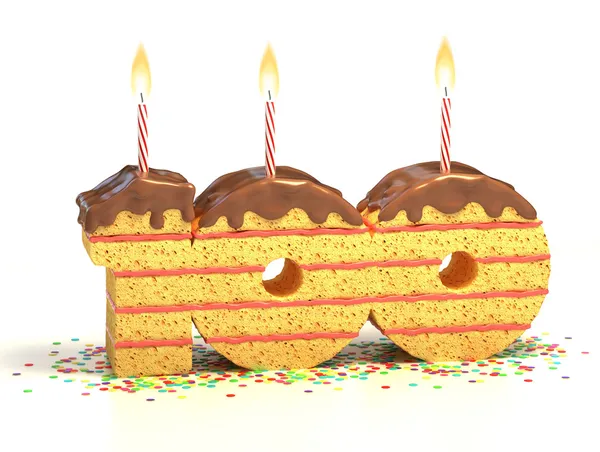 В окружении конфетти с зажженной свечой на сотый день рождения или юбилей — стоковое фото