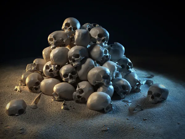 Montón de cráneos en la oscuridad —  Fotos de Stock