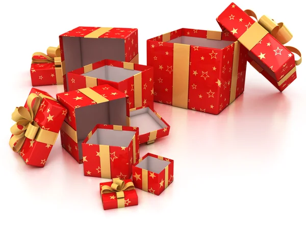 Cajas de regalo rojas abiertas con cinta dorada sobre fondo blanco — Foto de Stock