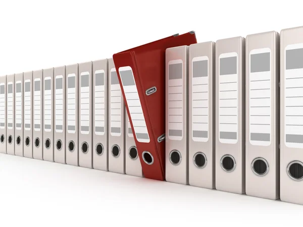Red ring binder standing out from a row of files — Stock Photo, Image