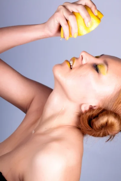 stock image Girl with grapefruit