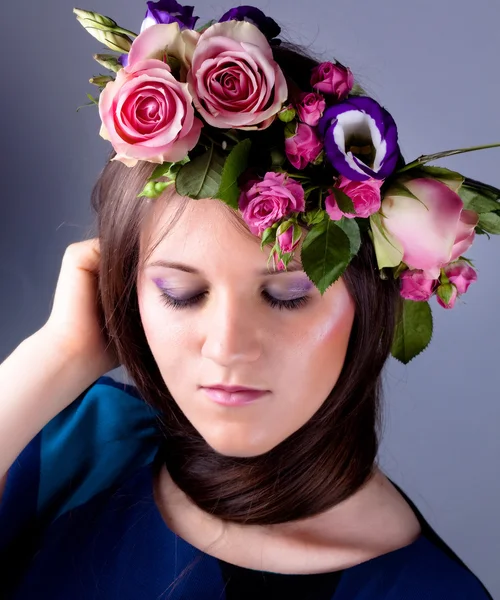Girl in the purple wreath — Stock Photo, Image