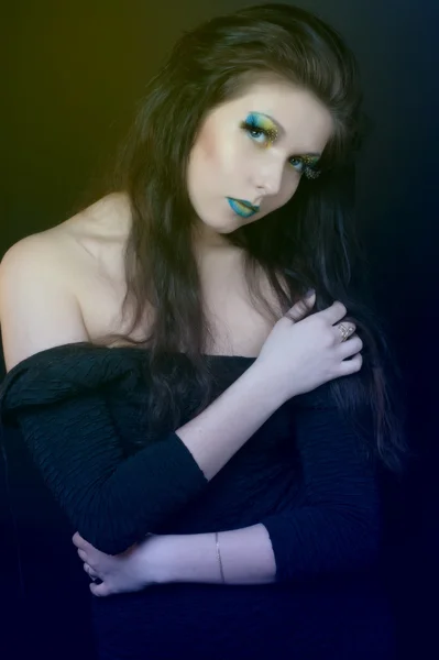 Dziewczyna z zielony makijaż — Zdjęcie stockowe