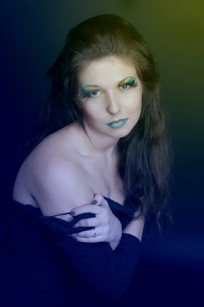 Meisje met groene make-up — Stockfoto