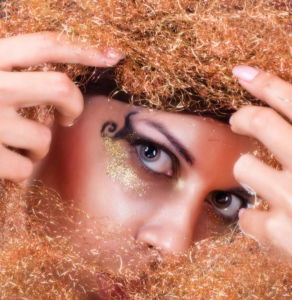 A girl with the golden visage — Stock Photo, Image