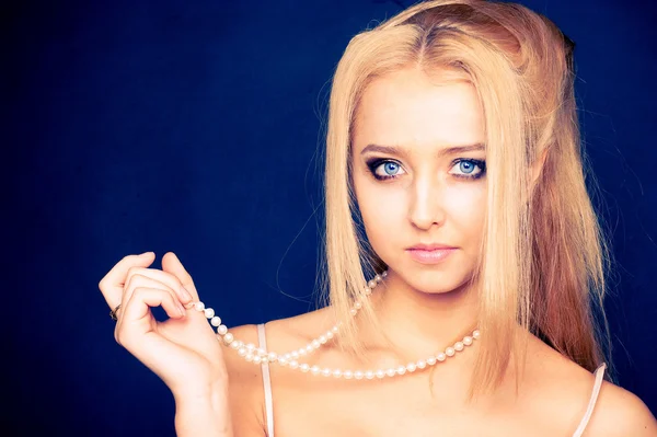Girl with a Pearl Chain Stock Image