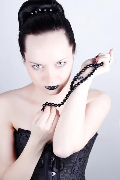Das Mädchen mit der schwarzen Perle — Stockfoto