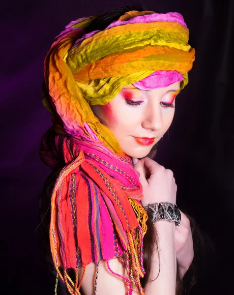 stock image Oriental girl with a scarf