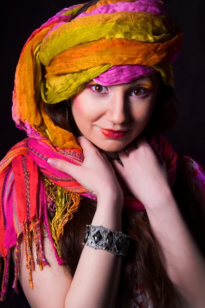 Oriental girl with a scarf Royalty Free Stock Images