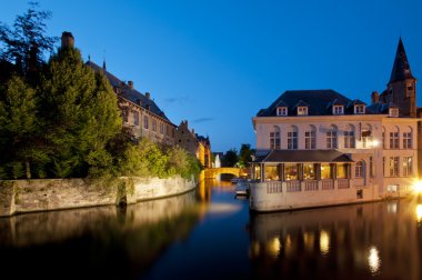 Canal houses of Bruges by night, Belgium clipart