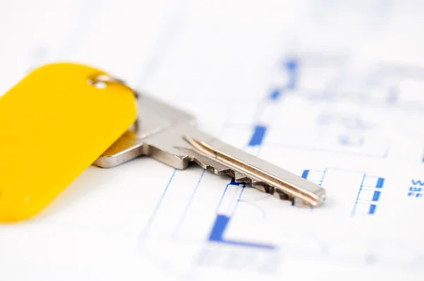 Key on an architecture-plan — Stock Photo, Image