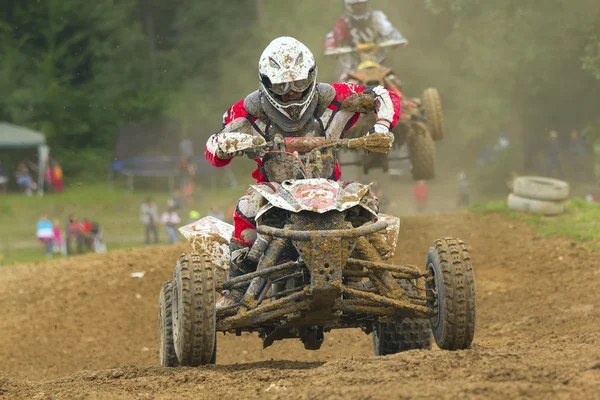 ATV rider and behind the rider in the jump — Stock Photo, Image
