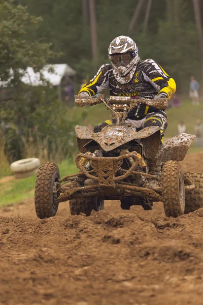 Quad Racer on the muddy track — Stock Photo, Image