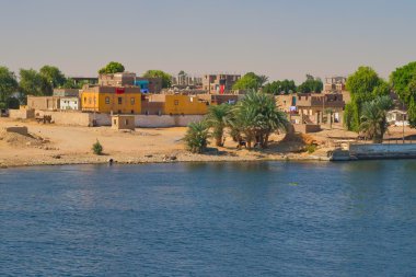 Arab village on the banks of the Nile clipart