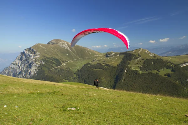 stock image Para-glider, which started to fly with a red parachute