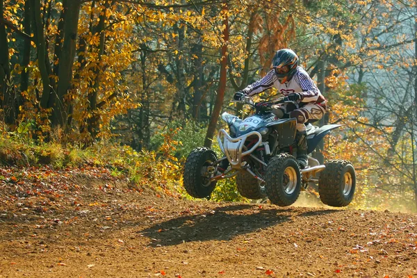 ATV rider saltos — Fotografia de Stock