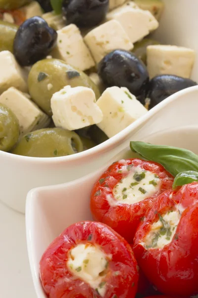 stock image Spicy round red peppers stuffed with cheese