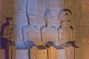 Rare statues inside of Abu Simbel Temple. clipart