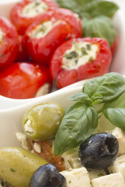 Salad of black, green olives with pieces of cheese. — Stock Photo, Image