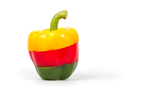 Fette di un pepe verde, rosso e giallo — Foto Stock