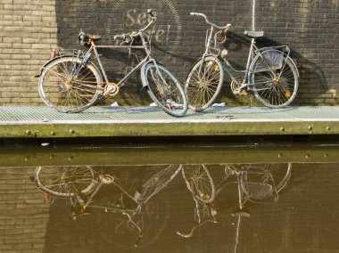 Two rusted bicycles clipart