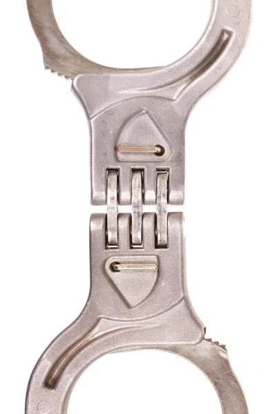 Een close-up van metalen handboeien — Stockfoto