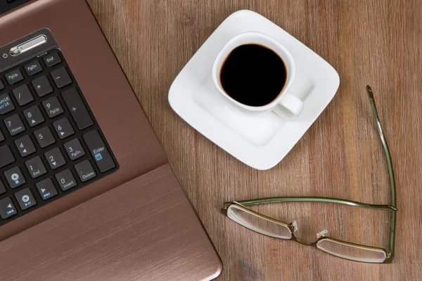 Espresso koffie met laptop — Stockfoto