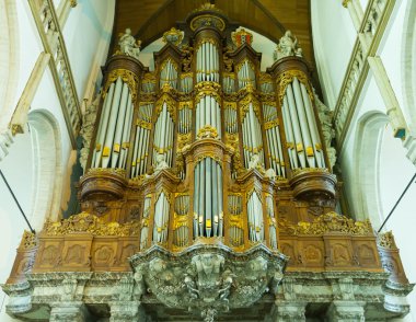 Pipe organ in Interior of the Big Church of Amsterdam, Holland clipart