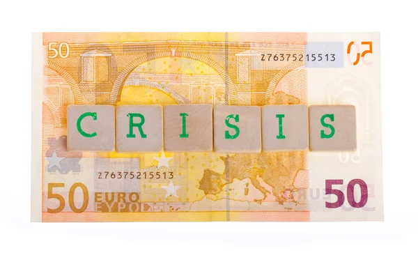 Carta en bloques encima de un billete de 50 euros — Foto de Stock