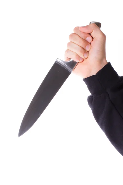 Мужчина с острым ножом в руке — стоковое фото