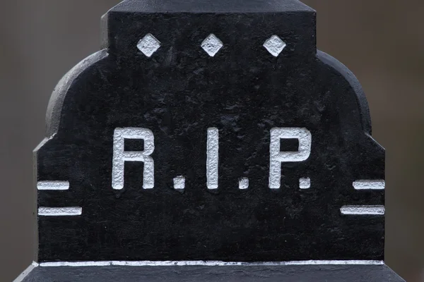 La lettera RIP su una tomba — Foto Stock