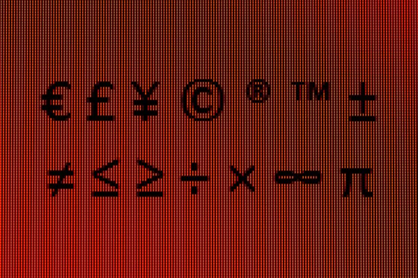 在计算机屏幕上的特写中的符号 — 图库照片