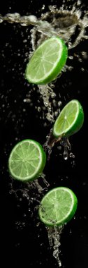 Limes with water splash clipart