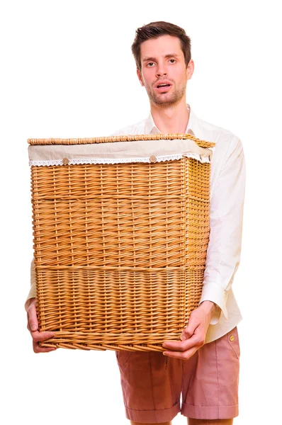 Young man holding a large flasket — Stock Photo, Image