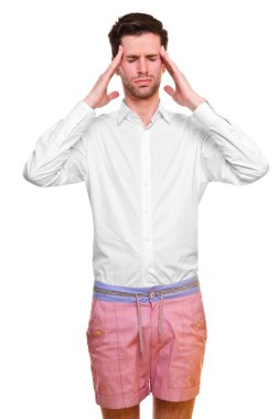 A young man grasping his head clipart